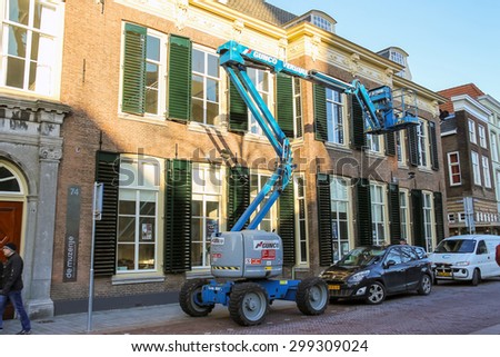 Den Bosch, Netherlands - January 17, 2015: Car Tower - hoist works on the street in  Dutch city of Den Bosch
