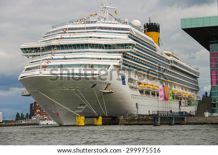 Amsterdam, Netherlands - June 20, 2015: Cruise ship Costa Fortuna stands in the passenger terminal of Amsterdam