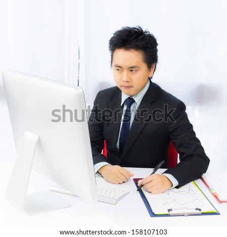 business man working with desktop computer