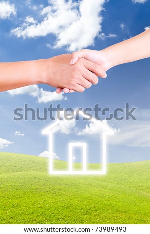 hand shaking and house icon