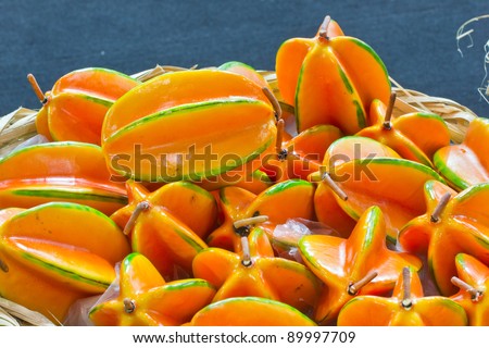 pile of star fruits in bamboo basket