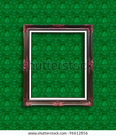 frame on green wallpaper