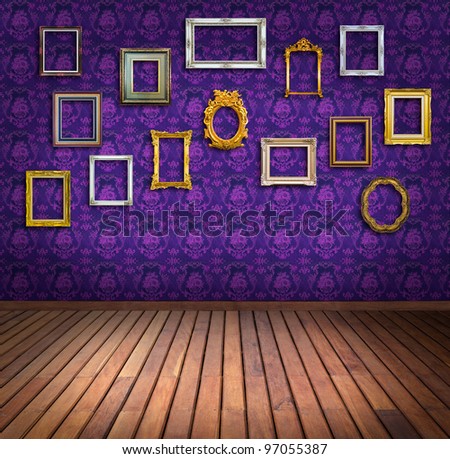vintage frame in purple wallpaper room