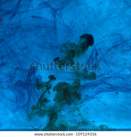 Smoke creation Description: Black ink in the blue water