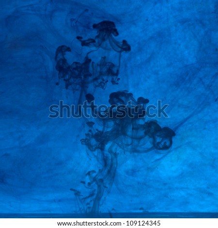 Twilight medusas Description: Blue ink in the water
