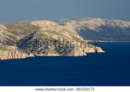 Beautiful landscape of the barren land island and the blue sea