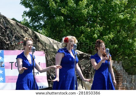 CRESSING TEMPLE ENGLAND 17 May 2015: Female singers in swing style