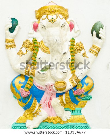 God of success 3 of 32 posture. Indian style or Hindu God Ganesha avatar image in stucco low relief technique with vivid color,Wat Samarn, Chachoengsao,Thailand.