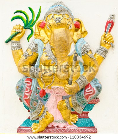 God of success 15 of 32 posture. Indian style or Hindu God Ganesha avatar image in stucco low relief technique with vivid color,Wat Samarn, Chachoengsao,Thailand.