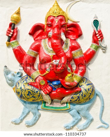 God of success 18 of 32 posture. Indian style or Hindu God Ganesha avatar image in stucco low relief technique with vivid color,Wat Samarn, Chachoengsao,Thailand.