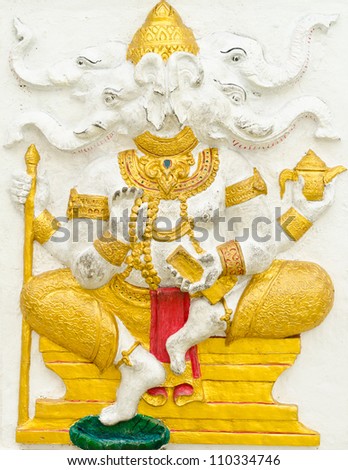 God of success 6 of 32 posture. Indian style or Hindu God Ganesha avatar image in stucco low relief technique with vivid color,Wat Samarn, Chachoengsao,Thailand.
