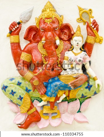 God of success 17 of 32 posture. Indian style or Hindu God Ganesha avatar image in stucco low relief technique with vivid color,Wat Samarn, Chachoengsao,Thailand.