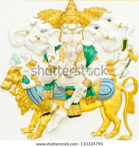 God of success 11 of 32 posture. Indian style or Hindu God Ganesha avatar image in stucco low relief technique with vivid color,Wat Samarn, Chachoengsao,Thailand.
