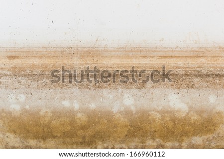 Abstract Background Texture of water level stain pattern after flood on wall house at Thailand stain pattern after flood on wall house at Thailand