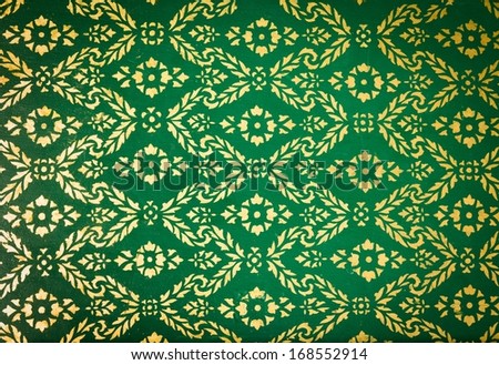 background texture of vintage pattern in traditional Thai style art painting on temple wall