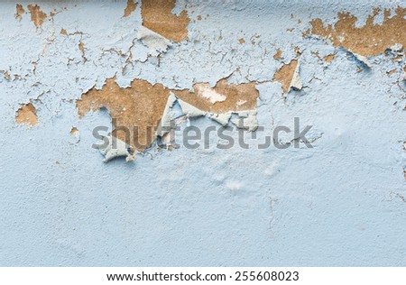 close up background and texture of peeling paint on pastering wall because moisture of water
