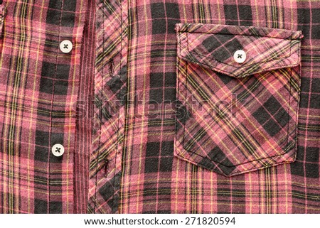 close up pattern of man\'s cotton plaid shirt background
