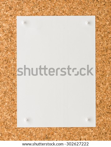 close up Blank white paper note sheet with white push pin on cork board background for write memo