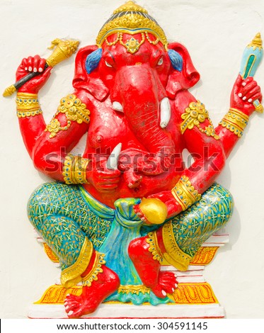 God of success 26 of 32 posture. Indian style or Hindu God Ganesha avatar image in stucco low relief technique with vivid color,Wat Samarn, Chachoengsao,Thailand.