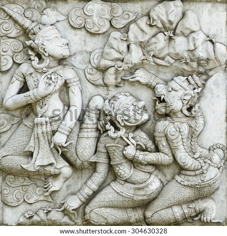 masterpiece of traditional Thai style stucco art old about Ramayana story on temple decorative wall at Wat Panan Choeng temple, Ayutthaya, Thailand. World Heritage Site