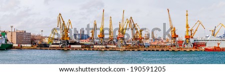Logistic center. Port cranes in cargo front of Odessa sea commercial port.