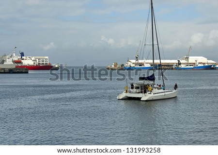 Launch boat in Cape Town harbor bay