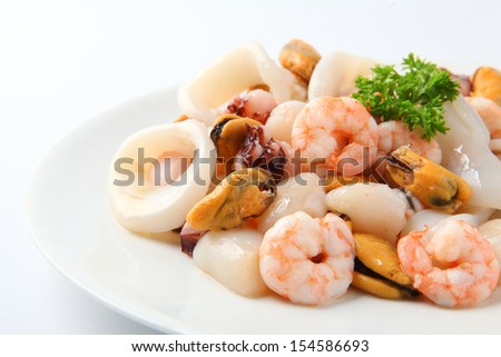 Raw Mixed Seafood Isolated On White Background