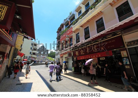 MACAU-JULY 4 : Tourists visit the Historic Center of Macao on July 4, 2011 in Macau, China. The Historic Centre of Macao was inscribed on the UNESCO World Heritage List in 2005.
