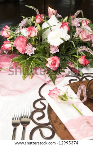 stock photo Wedding Table flower arrangement with pink roses