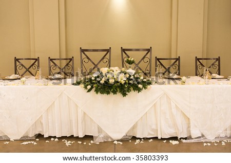 stock photo Main table at a wedding reception with beautiful flowers