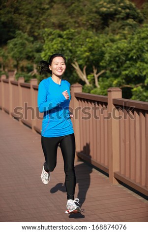 active woman jogging outdoor in the morning