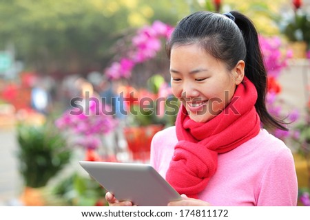 woman use tablet in street