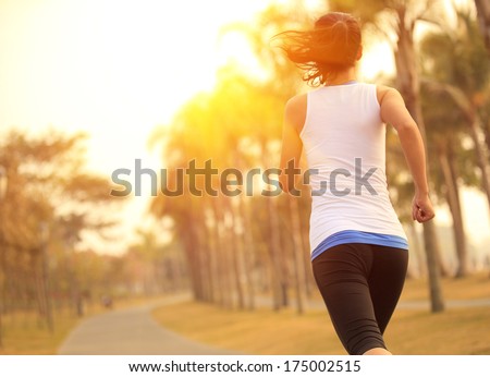 Healthy Lifestyle Young Sporty Asian Woman Running At Tropical Park