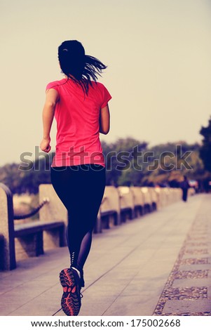 healthy lifestyle beautiful asian woman running at seaside under sunrise healthy lifestyle beautiful asian woman running at seaside under sunrise