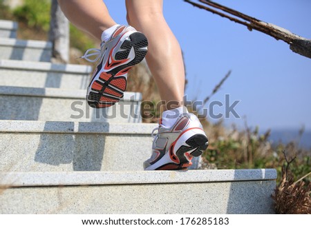 sports legs running/move up on mountain stairs