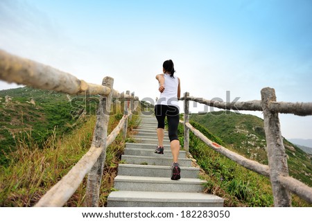 healthy lifestyle sports woman running on mountain stairs healthy lifestyle sports woman running on mountain stairs