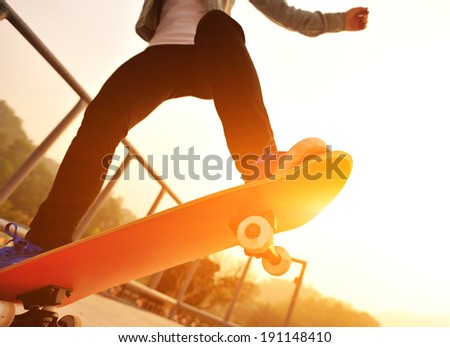 skateboarding woman sunrise