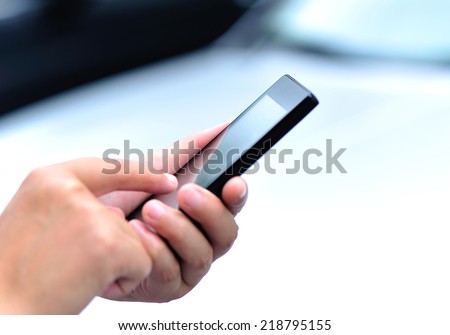 woman hands use cell phone outdoor