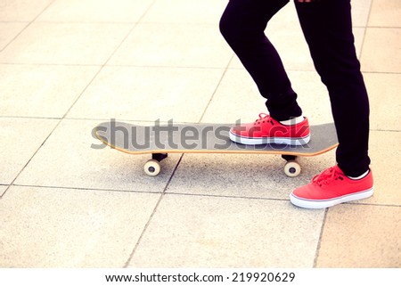 skateboarding woman in the city