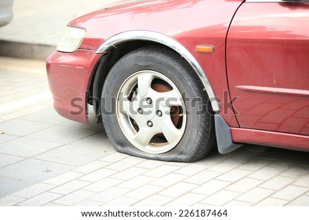 flat tire on car wheel