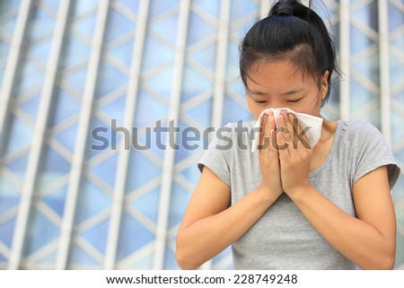cough woman sneeze nose outdoor