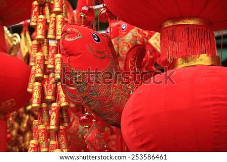 chinese red lantern and fake firecrackers:words mean best wishes and good luck for the coming chinese new year