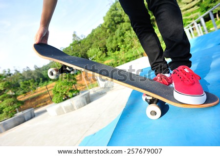 skateboarding woman legs a  skatepark