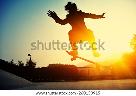 young skateboarder legs skateboarding at skatepark young skateboarder legs skateboarding at skatepark
