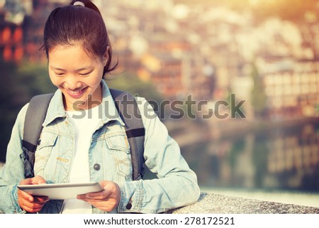 young woman tourist use digital tablet