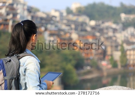young woman tourist use digital tablet