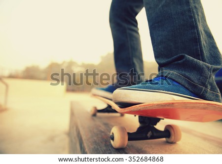 skateboarder legs skateboarding at skate park