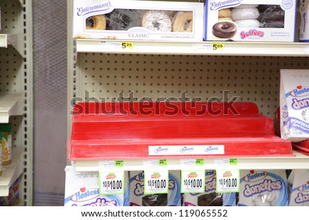 MADISON,WI-NOV16: Grocery store shelves empty out as customers buy up Hostess Brand snacks such as Twinkies after Hostess announces it is filing bankruptcy and closing  plants, on Friday Nov 16, 2012