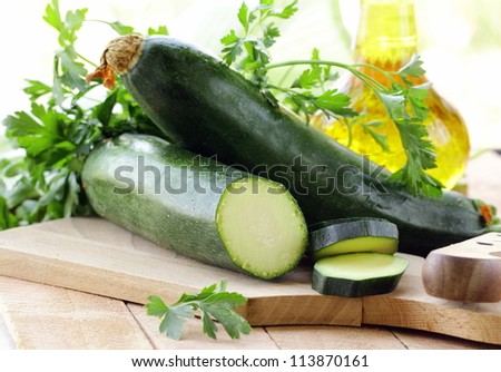 fresh ripe zucchini on the cutting board