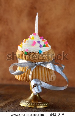 cupcake with  candle and  cream for  birthday